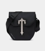 Black Trapstar Crossbody Bag featuring signature logo branding, adjustable shoulder strap, secure zip compartments, and a compact streetwear design.
