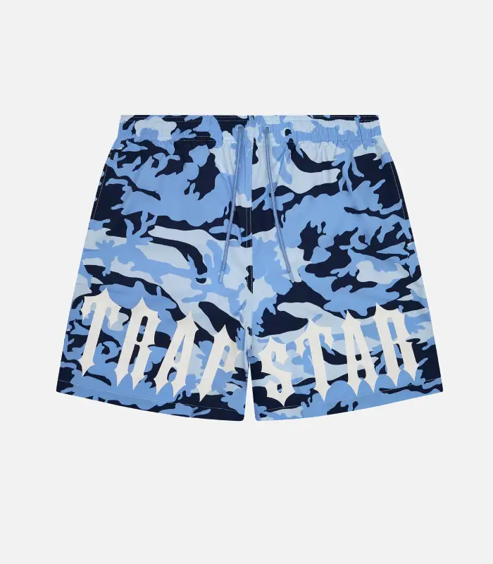 Trapstar Irongate Shorts Blue Camouflage – Premium Streetwear Shorts Blue camouflage Trapstar Irongate shorts featuring signature branding, an elastic waistband, functional pockets, and a relaxed streetwear fit.