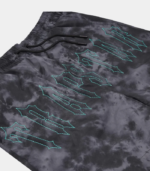 Black Trapstar Pigment Irongate shorts featuring signature Irongate branding, pigment-washed detailing, an adjustable waistband, and a relaxed fit.