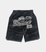 Black Trapstar Shooters SS23 Basketball shorts featuring signature Shooters branding, an elastic waistband, side pockets, and a relaxed athletic fit.