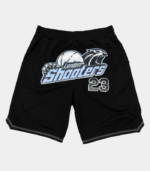 Black and ice blue Trapstar Shooters SS23 Basketball shorts featuring signature Shooters branding, an elastic waistband, side pockets, and a relaxed athletic fit.