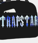 Black Trapstar Shoulder Bag featuring signature logo branding, adjustable shoulder strap, secure zip compartments, and a sleek everyday design.